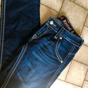 Women’s rock revivals size 31 dark wash straight